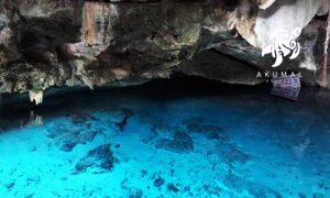 Dos Ojos is has 2 main caves for snorkeling, one from which scuba divers can bee seen below.