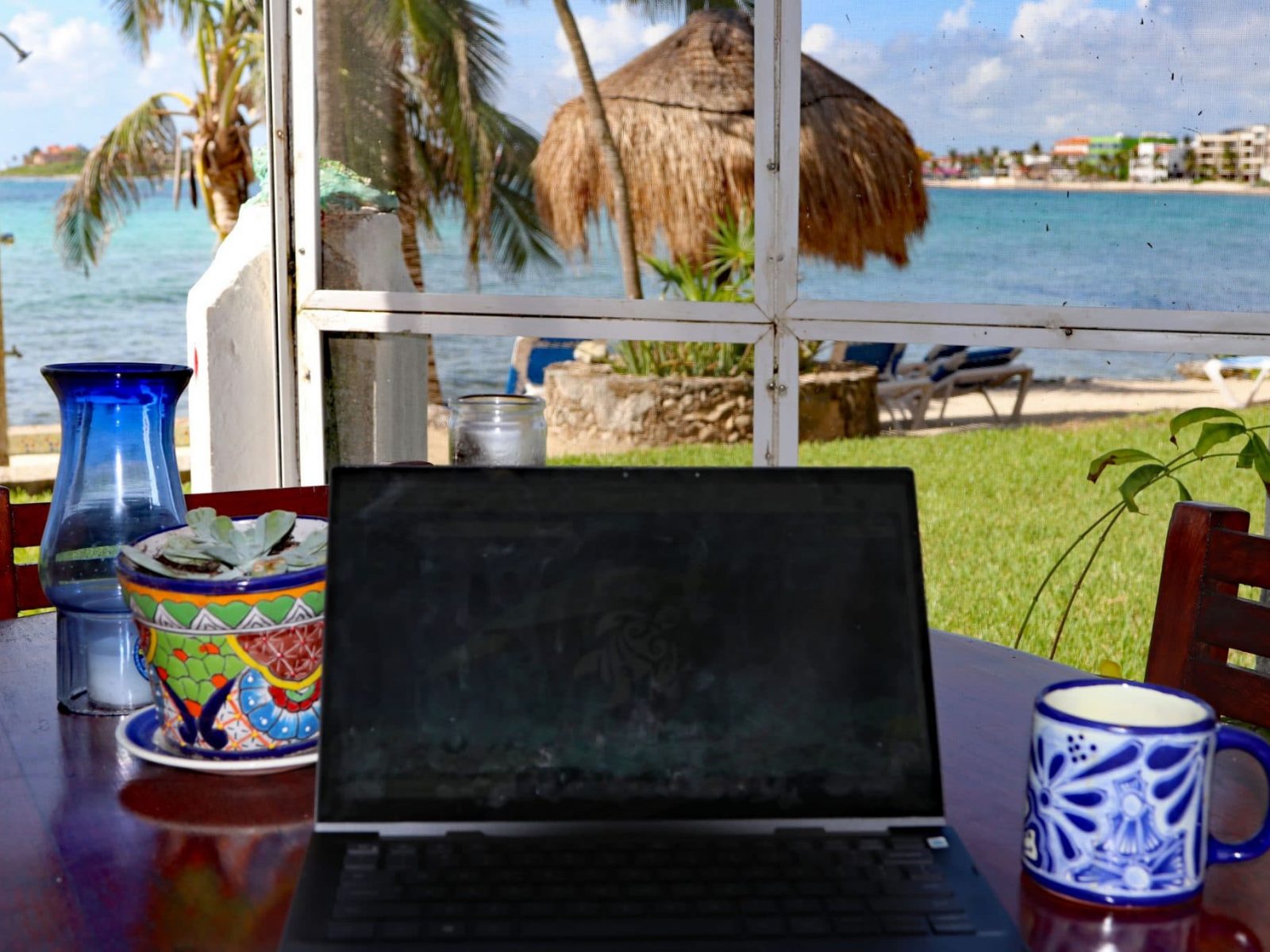 LauritaMar, La Sirena 2: The Screened Beach Porch's Table Makes a Great Work Area