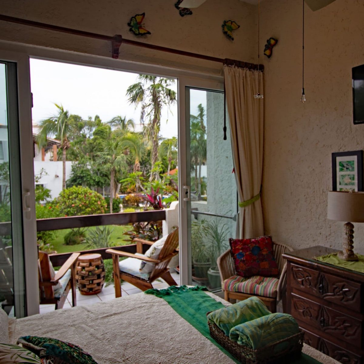 Seascape, La Sirena 1: The 2nd bedroom with personal TV and it's private porch overlooking La Sirena's gardens